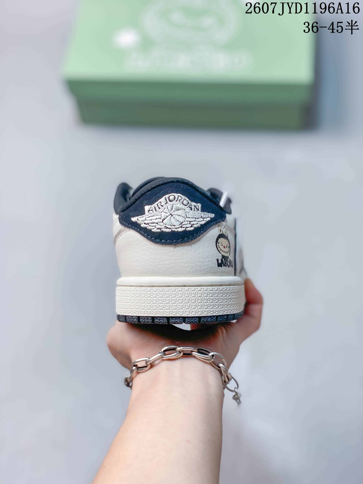 Rear view showing the embroidered Air Jordan Wings-style heel detail and Labubu graphic.