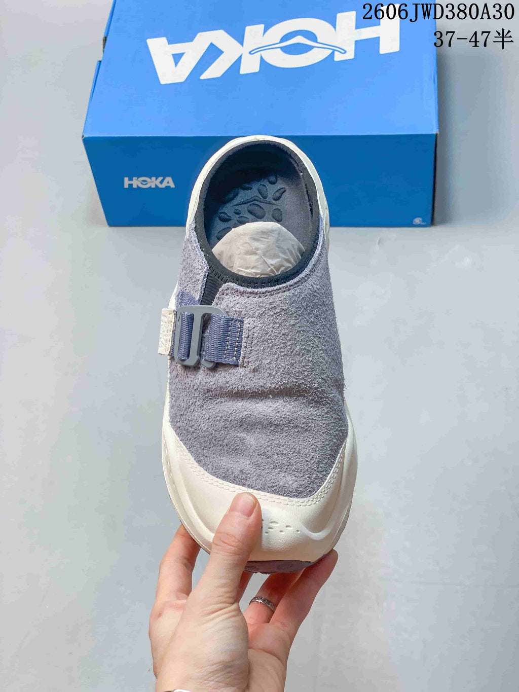 Top view of a gray HOKA Ora Primo EXT mule shoe with an adjustable strap