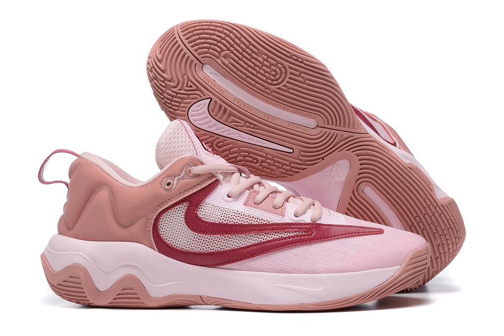 Light pink basketball shoe with dark rose accents