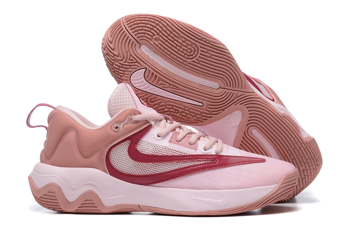 Light pink basketball shoe with dark rose accents