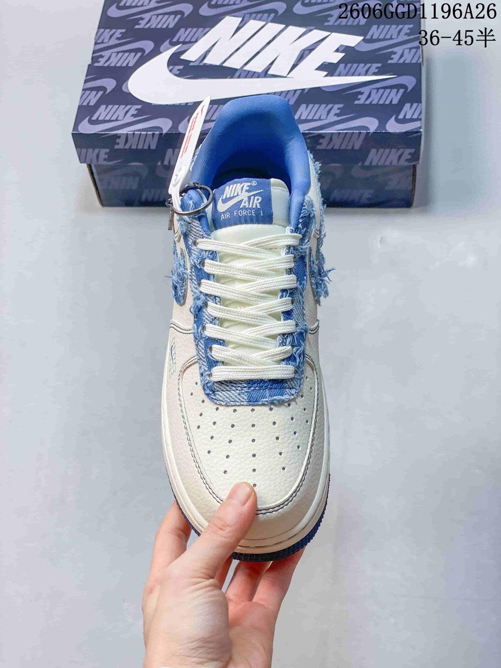Top view showing the laces, perforated toe, and denim eyestay