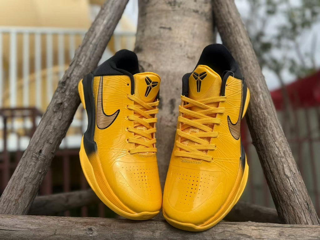 Front view showing perforated toe areas, laces, and tongue logos.