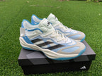 Side view of the white and blue Adidas Adizero shoes with black stripes.