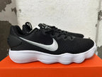 Side view of a black Nike Hyperdunk 2017 shoe with a silver Swoosh and white ridged outsole