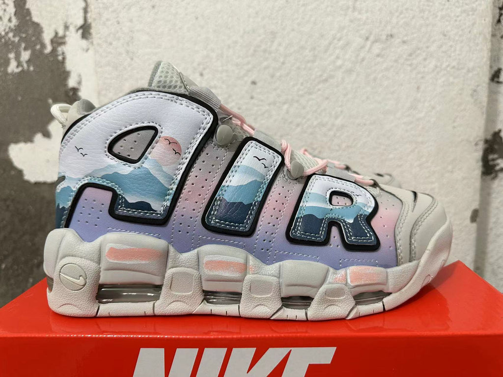 Side view showing oversized AIR lettering, blue graphic panels, and lavender and pink accents