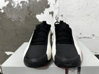 Front view showing black laces and toe areas with adidas logos