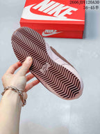 Close-up of the Nike Classic Cortez zigzag-patterned outsole in brown