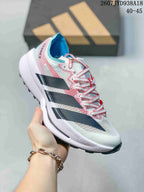 Angled side view of the white running shoe with pink and blue upper accents, black side details, white midsole, and textured outsole; size range text 40–45 is visible.