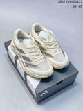 Pair of off-white adidas Adizero Evo SL M sneakers displayed on a shoebox, with silver side stripes and the size range 36–45 shown above.
