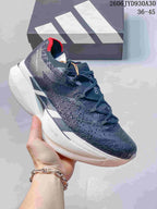 Dark navy adidas Adizero Prime X3 shoe with a light-colored sole.