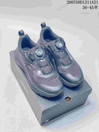 Pair of black DESCENTE LAVITATE WIRE 3.0 sneakers shown from above on a shoebox, with BOA dials and style code 2607GHD1211A21 visible.