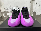 Front view of purple and black lace-up high-top sneakers with lavender toe accents