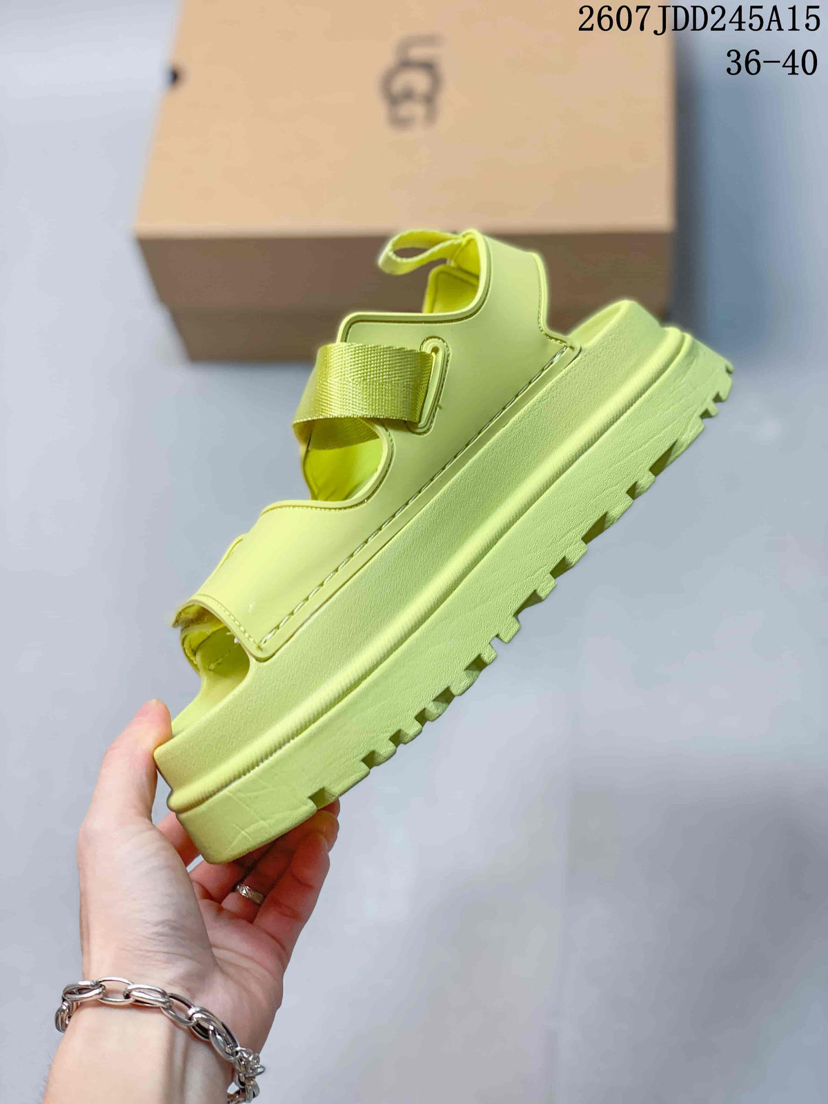 Side profile showing the platform sole, open-toe construction, and layered strap design.