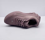 Top view of a pink alo sneaker highlighting the lacing system and textured upper.