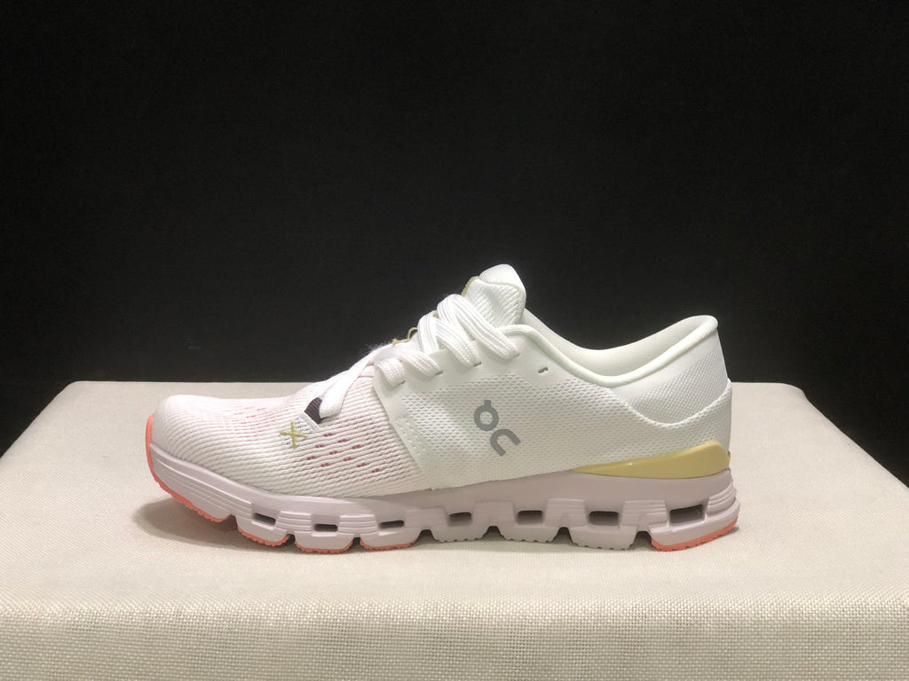 Lateral profile of one On Cloud X4 shoe showing the low-top shape and layered sole.