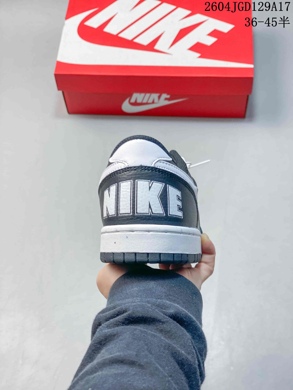 Rear view of the sneaker with large Nike lettering on the heel