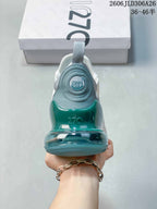 Rear view highlighting the teal heel unit and Air Max branding