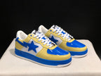 Pair of blue, yellow, and white BAPE STA low-top sneakers