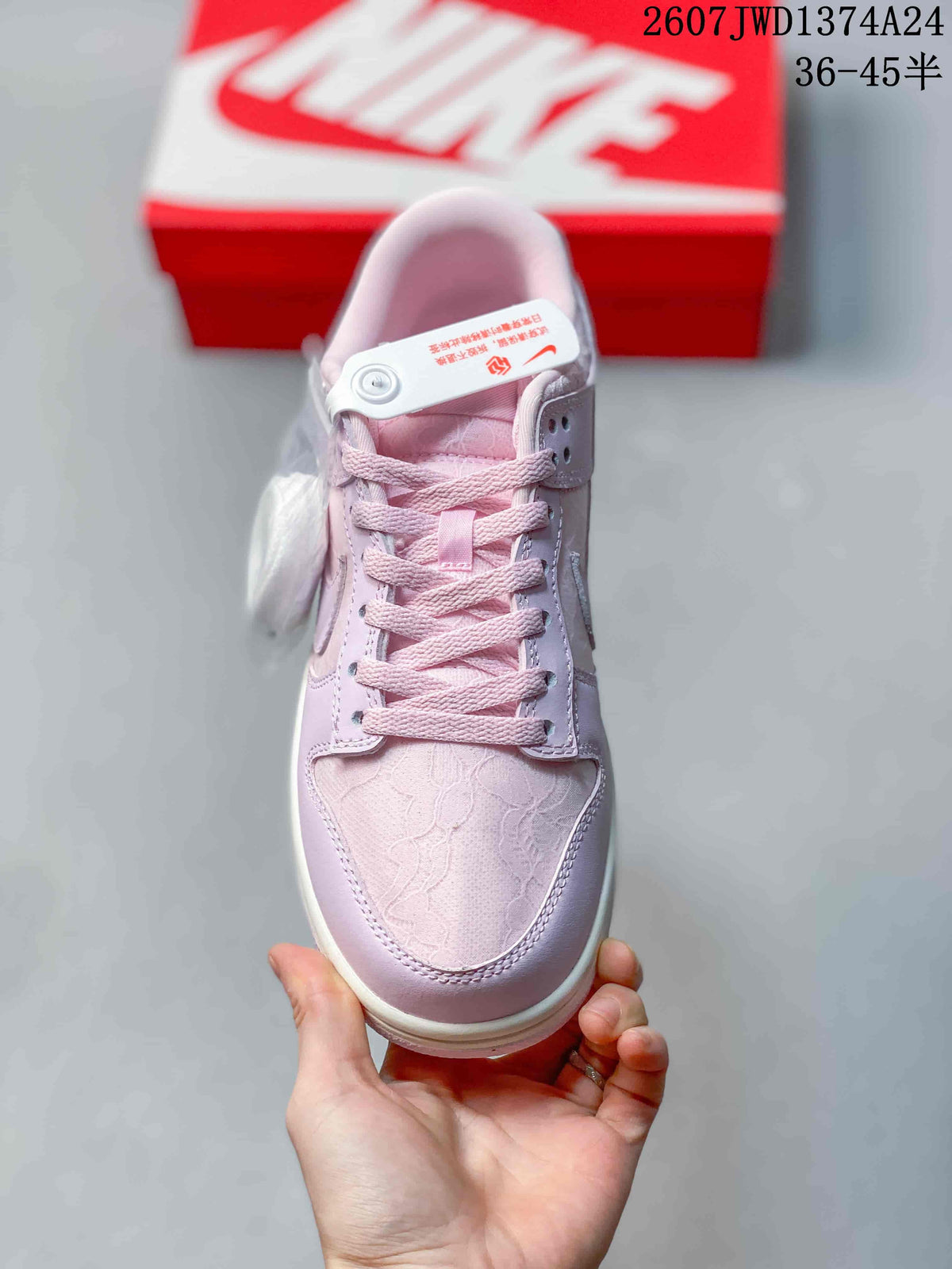 Top-down view showing the tonal laces and textured floral-style toe panel.