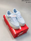 Light blue and white Nike Court Vision Alta sneakers displayed on a red shoebox, with the product code and size range visible above.