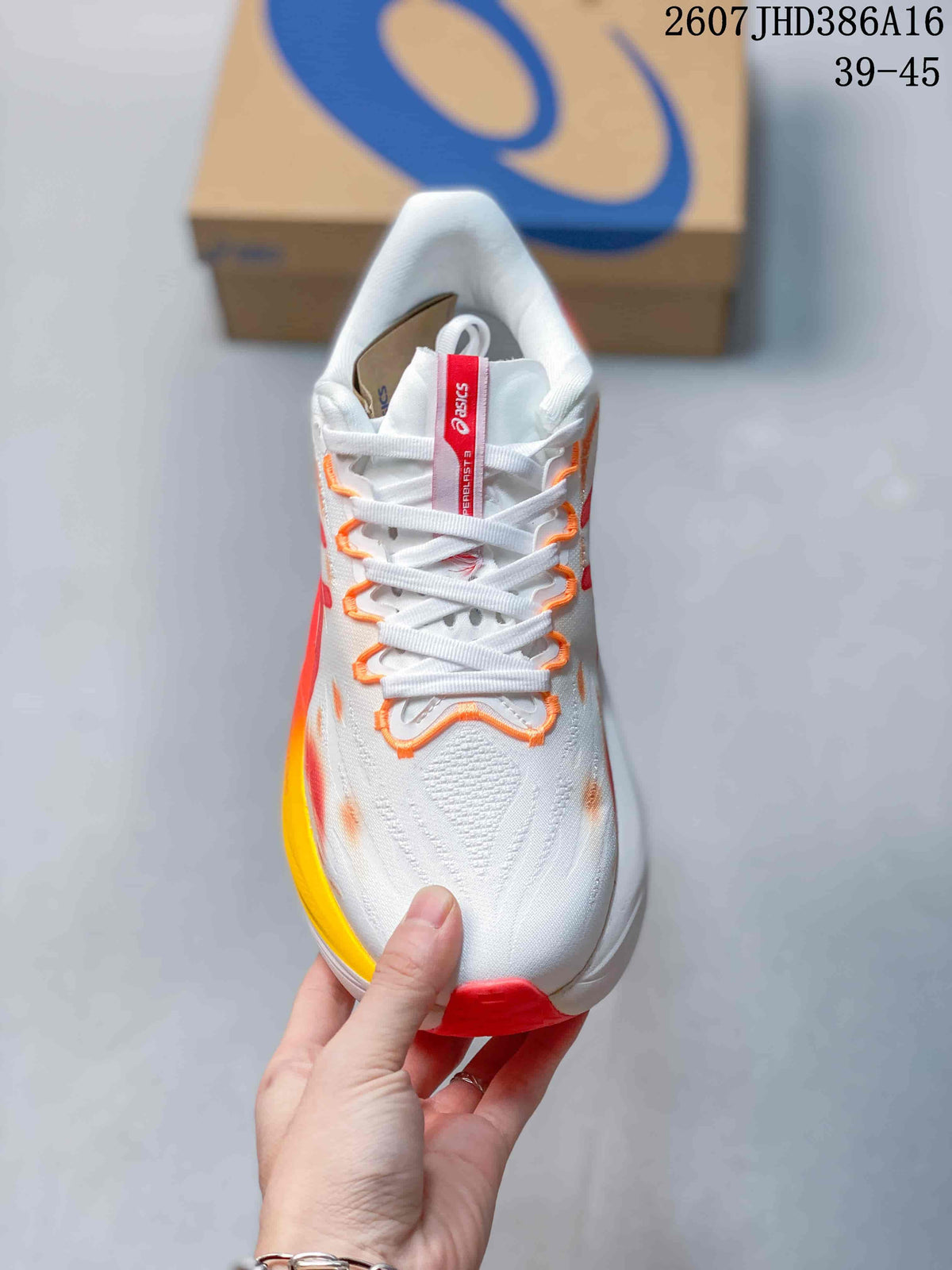 Top view showing the white mesh-like upper, white laces and orange-red detailing around the eyelets.