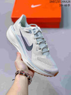 Angled side view showing the sneaker upper, swoosh detail and Air Zoom midsole branding.