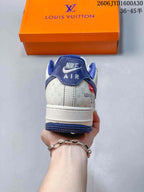 Rear view showing patterned heel panels and blue accents