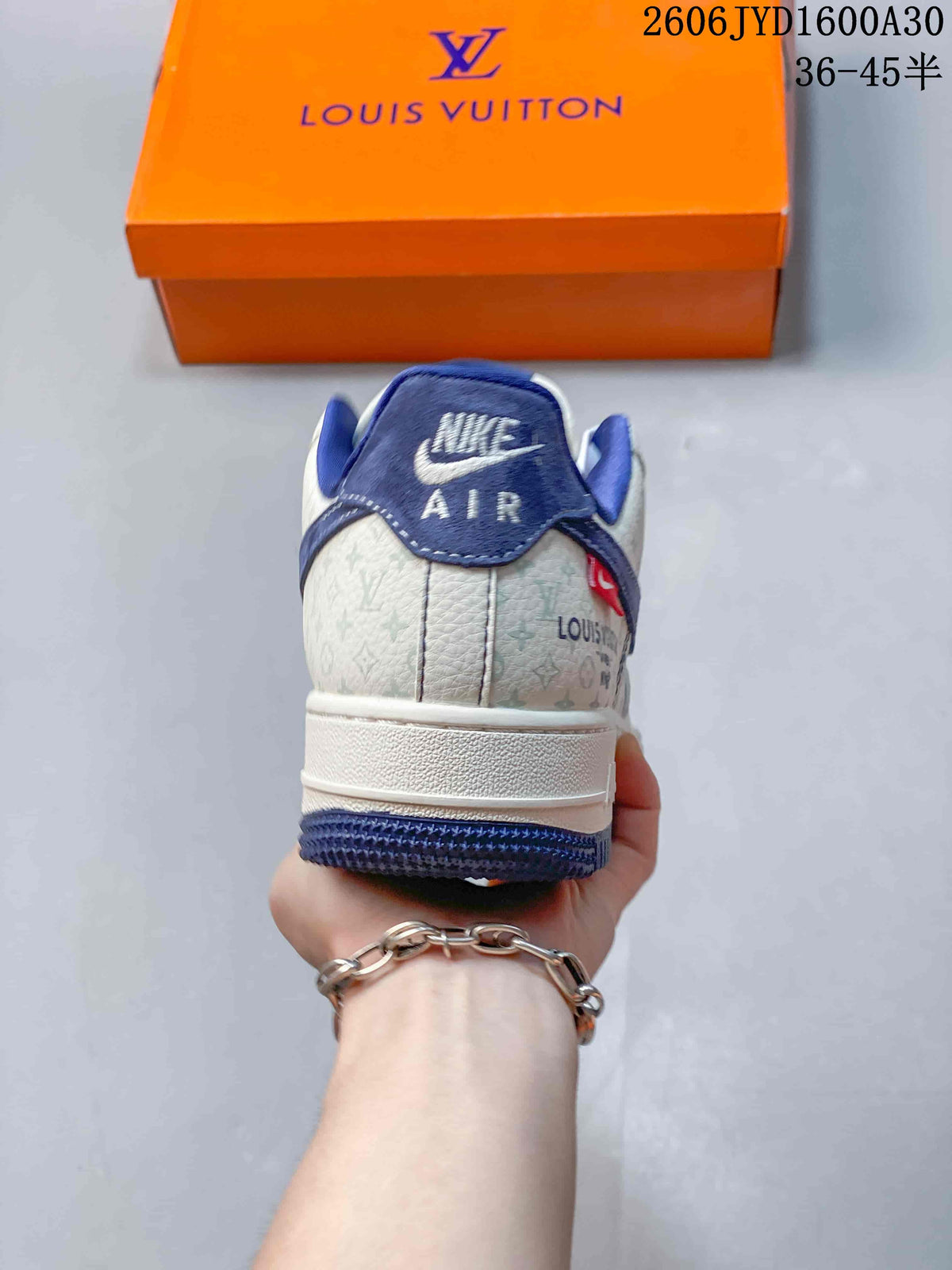 Rear view showing patterned heel panels and blue accents
