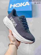 Dark blue HOKA Arahi 8 running shoe with a white sculpted sole.