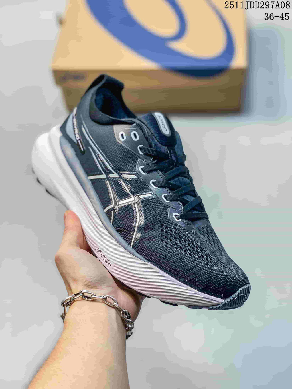 Three-quarter side view showing the dark upper, contrasting Asics side logo, white midsole, and visible FF BLAST+ marking.