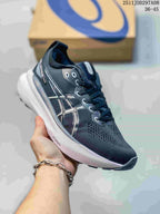 Three-quarter side view showing the dark upper, contrasting Asics side logo, white midsole, and visible FF BLAST+ marking.