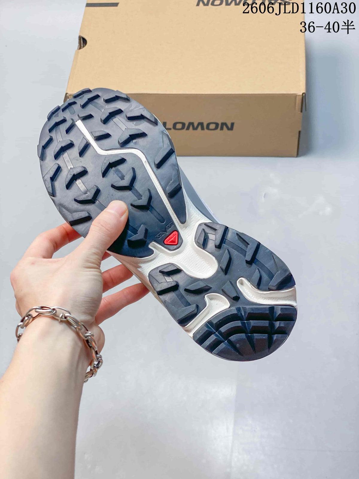 Close-up of the sneaker outsole showing a lugged tread pattern