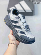 Three-quarter side view showing the Adidas Terrex branding, layered upper and rugged outsole.