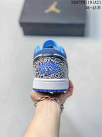 Rear view of the sneaker showing the elephant-print heel panel, blue outsole edge and white midsole.