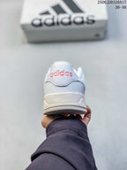 Rear view of the white adidas Entrap sneaker showing the padded heel and logo detail.