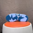 Underside view showing the blue and white outsole and Jumpman design