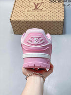 Rear view of a pink Trainer Maxi sneaker with logo detailing and a chunky sole.