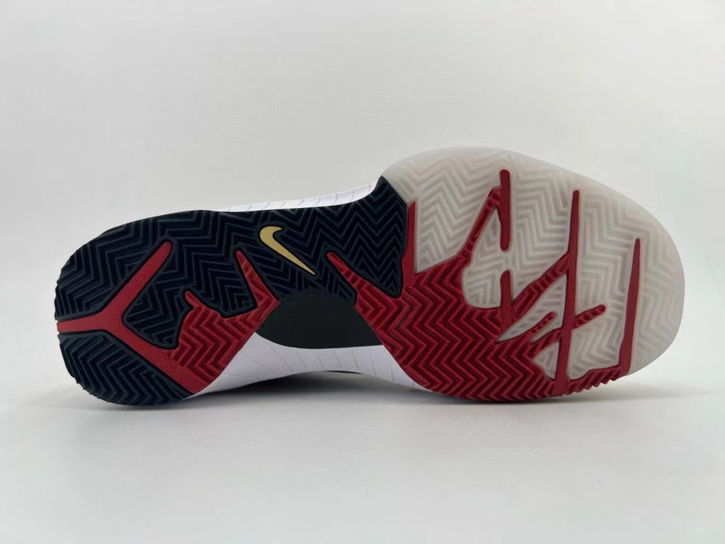 Underside view showing the black, red, and translucent patterned outsole.