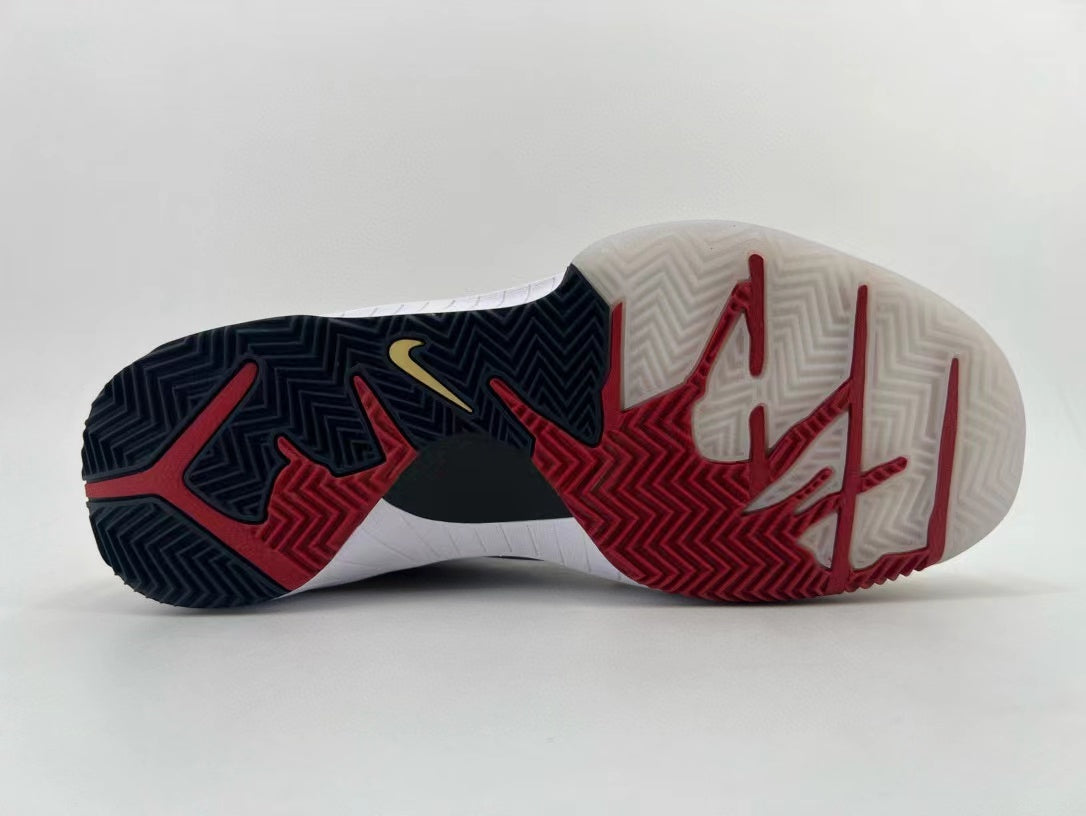 Underside view showing the black, red, and translucent patterned outsole.