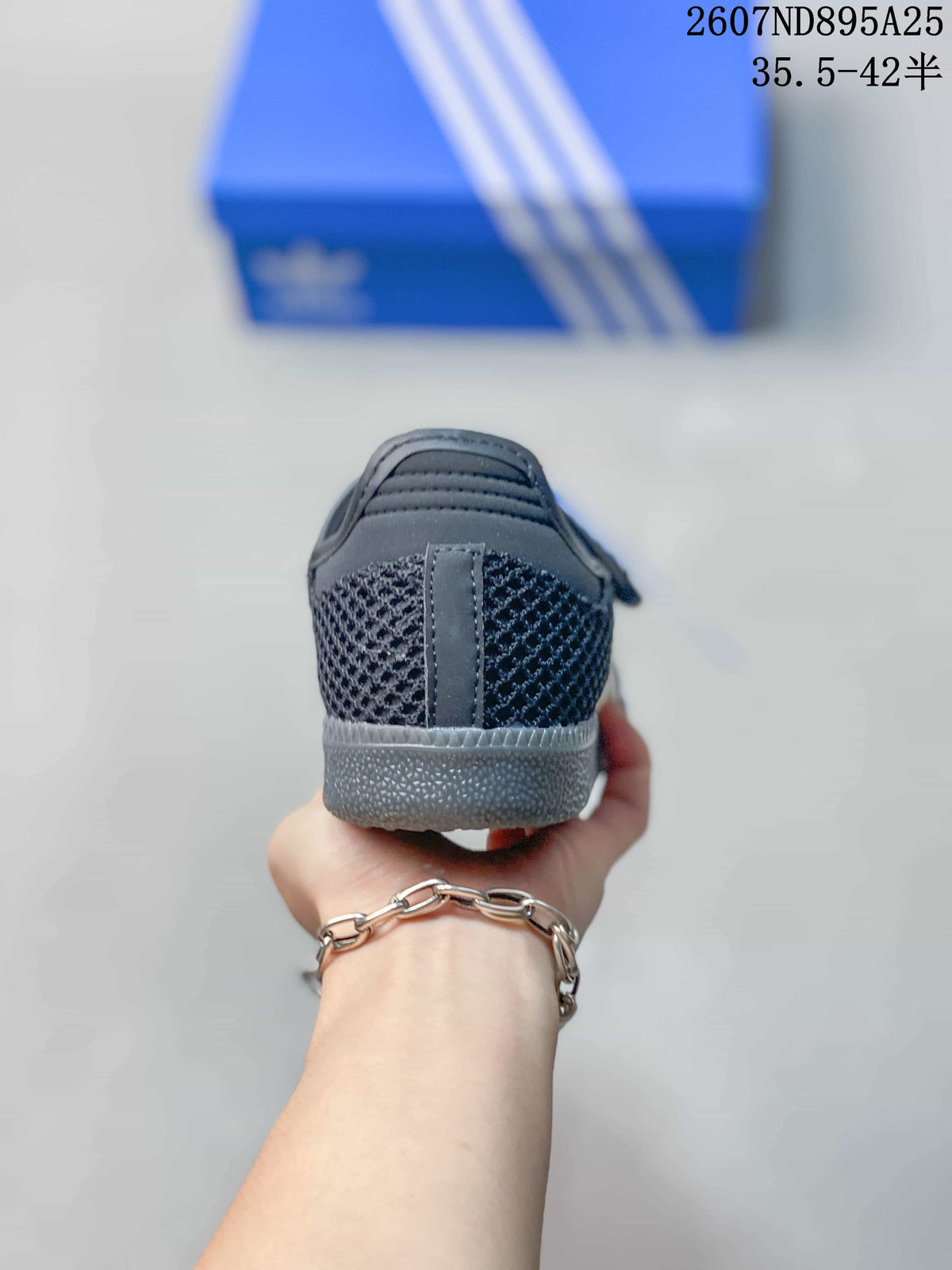Rear view showing the black mesh heel, padded collar, and gray outsole.