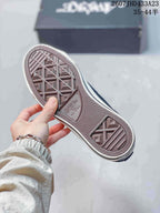 Close view of the textured rubber outsole with Converse All Star branding.