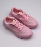 Top three-quarter view of the pink Alo sneaker pair showing the padded collars and lace layout.