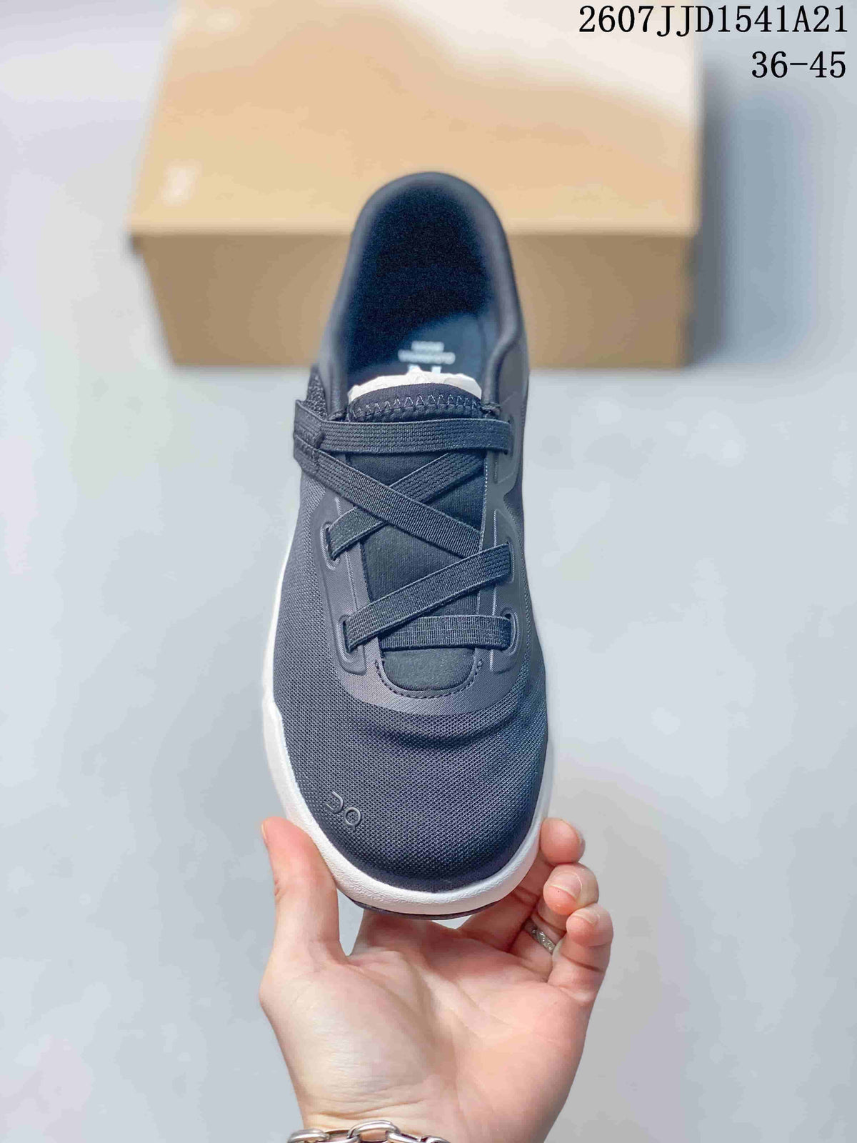 Top view highlighting the crossover lacing detail, padded tongue and dark navy upper.