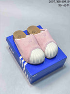 Pair of pink adidas Adimule closed-toe mule sneakers displayed on a blue shoebox; image text shows style code 2607JXD499A19 and size range 36–46.