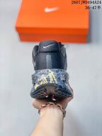 Rear view of the sneaker showing the Nike heel logo and patterned midsole detailing.