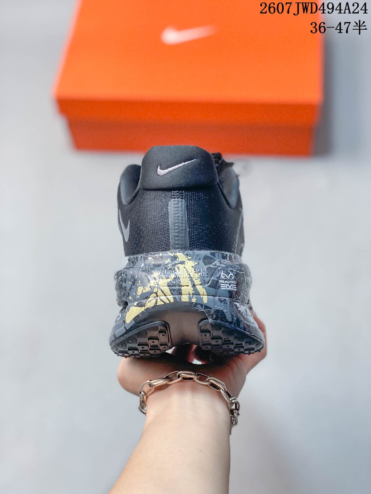 Rear view of the sneaker showing the Nike heel logo and patterned midsole detailing.