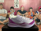 Side view of the shoes with a Nike Swoosh and patterned midsole.