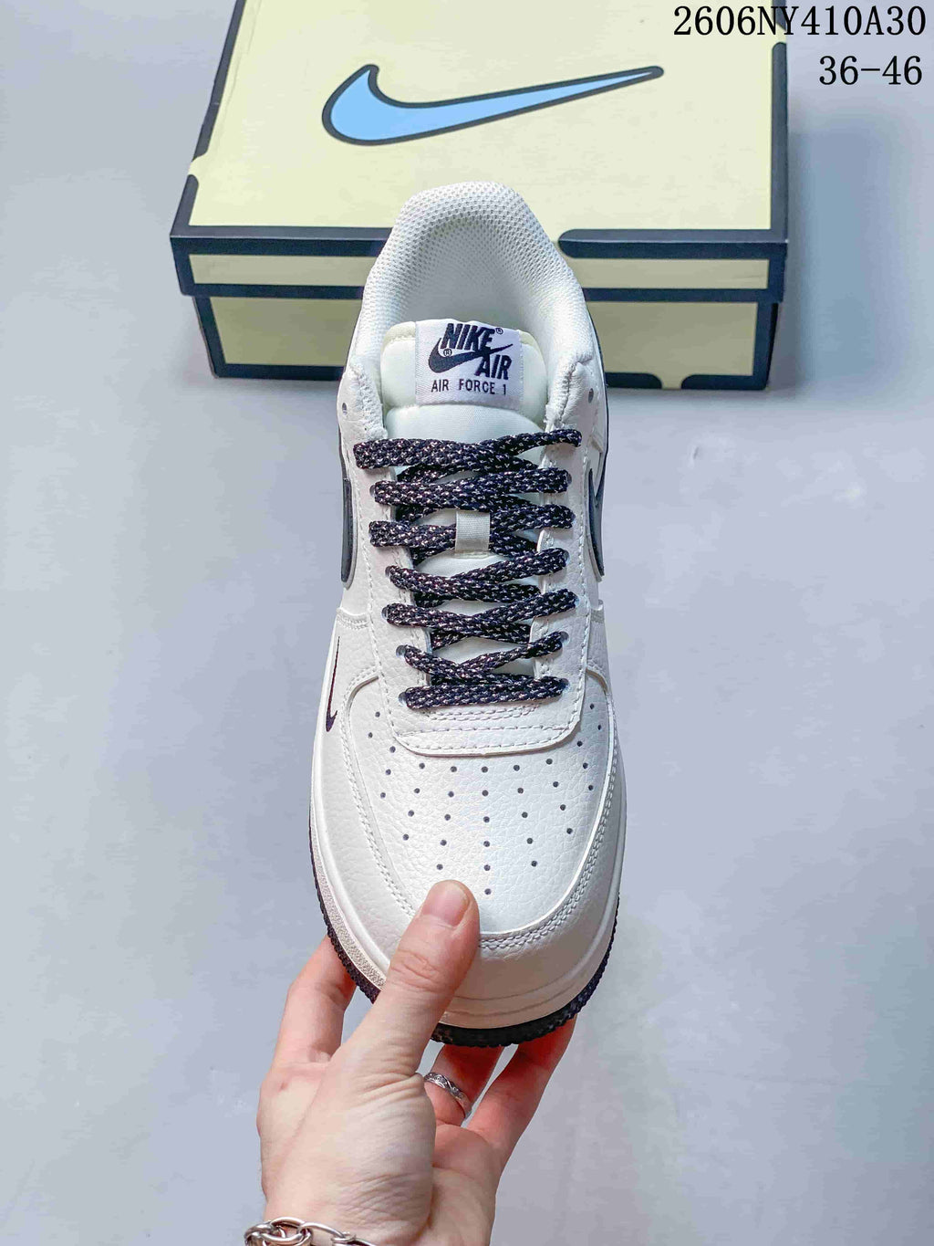 Top view showing the perforated toe, tongue branding, and patterned laces