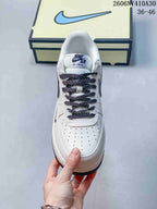 Top view showing the perforated toe, tongue branding, and patterned laces