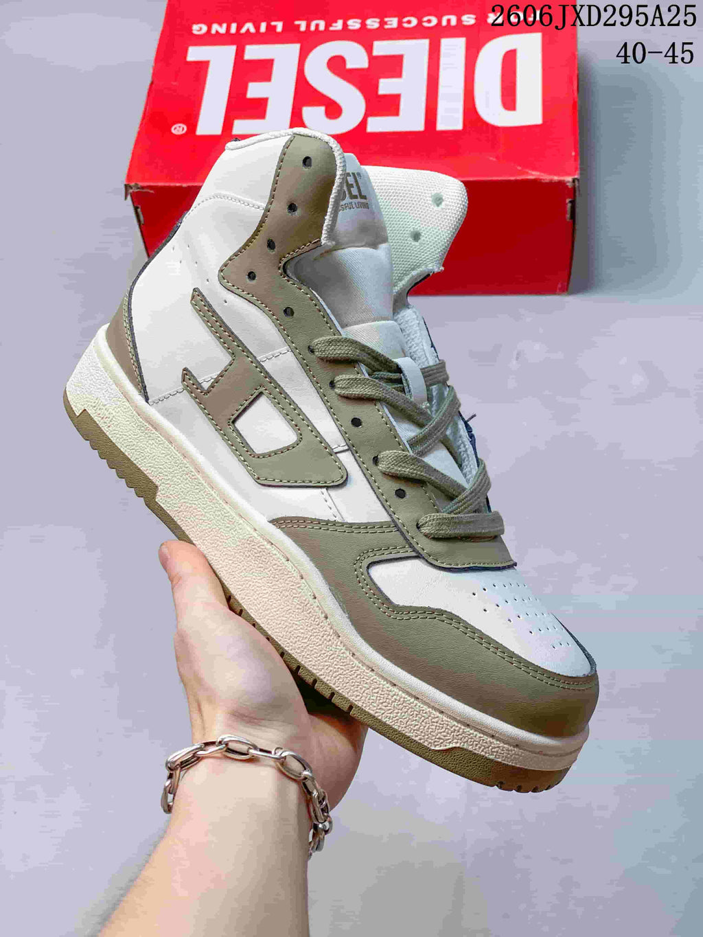 White Diesel S-Ukiyo high-top sneaker with gray-green panels and contrasting laces.